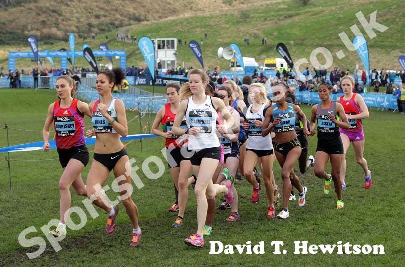 Emily Stewart (GB) running beside 2012 olympic 5000 metres champion Meseret Defar during the Internation Womens 3k BUPA Great Edinburgh Cross country. Photo: David T. Hewitson/Sports for All Pics